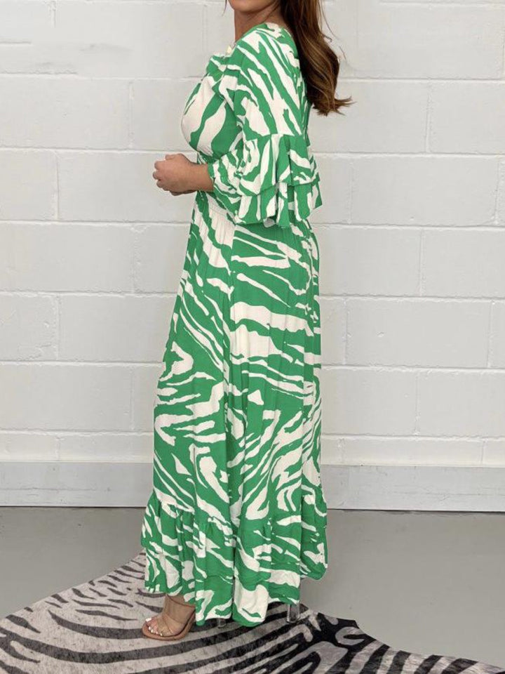 Smocked Printed Flounce Sleeve Maxi Dress by BlakWardrob