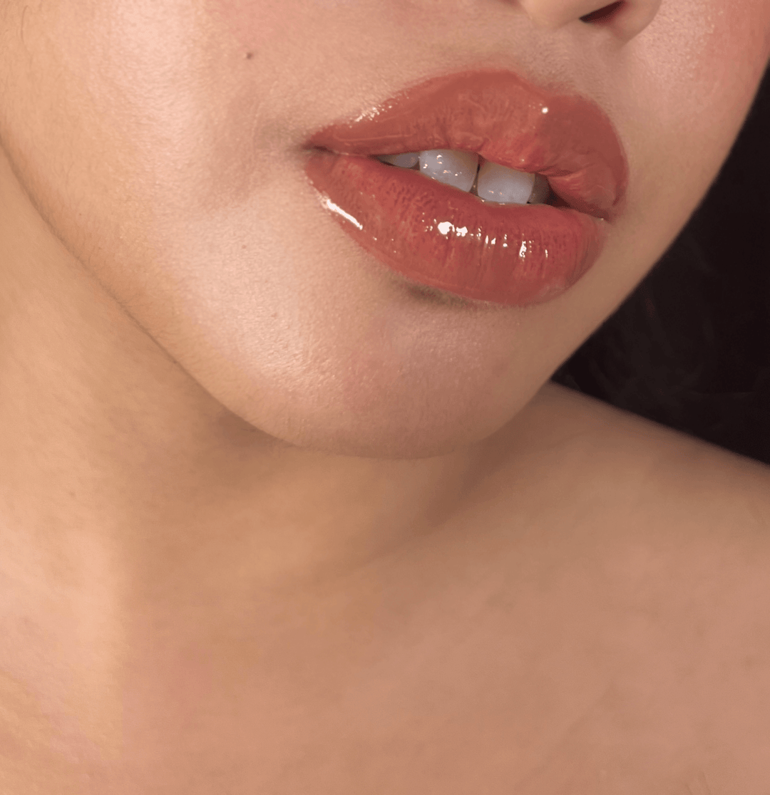 Bothered Iconic Nudez Lip Gloss by Stay Golden Cosmetics