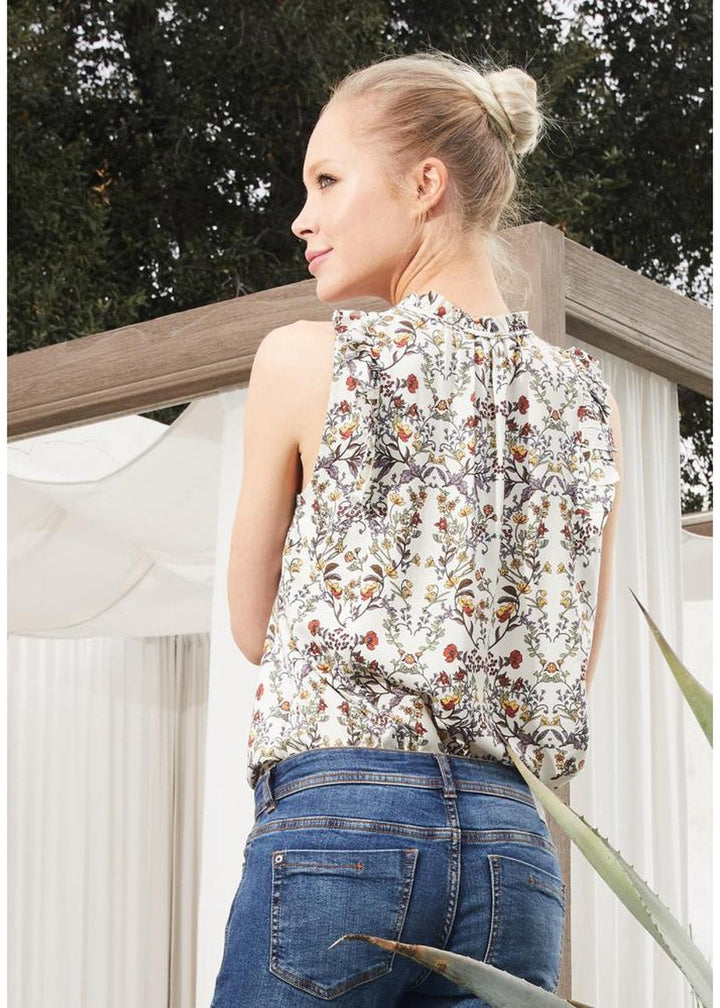 Sleeveless Tie Neck Blouse In Floral by Shop at Konus