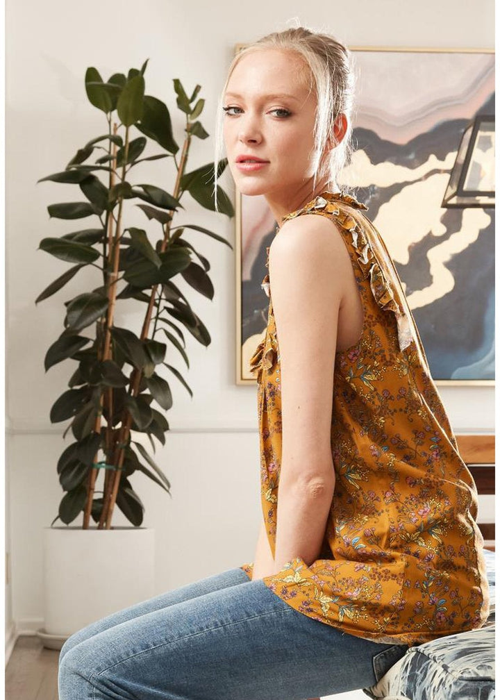 Sleeveless Tie Neck Blouse In Floral by Shop at Konus