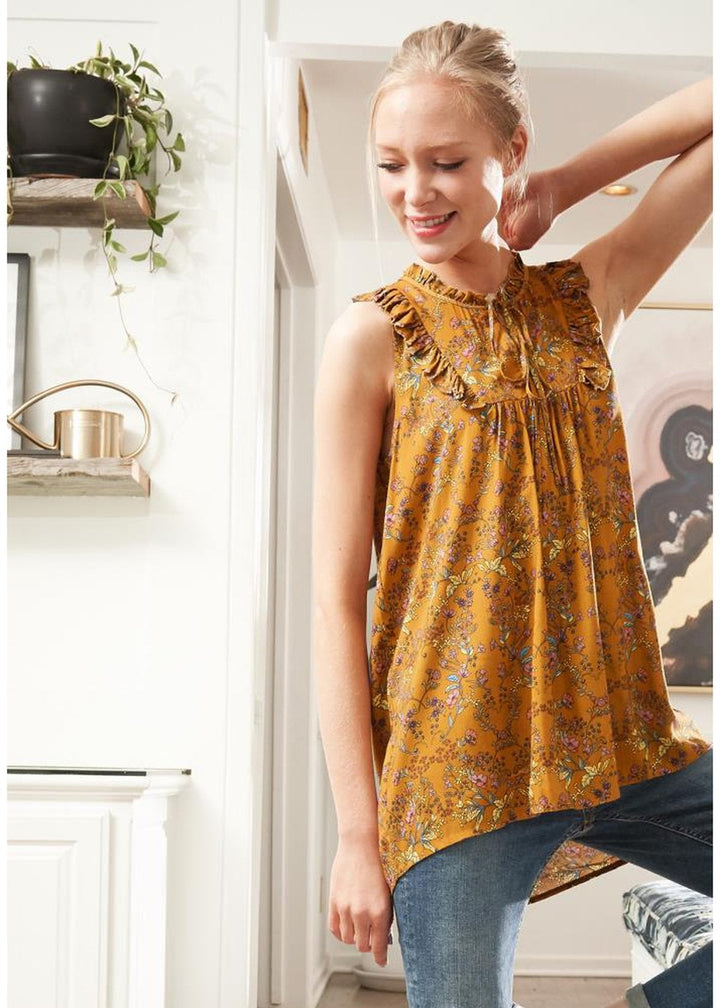 Sleeveless Tie Neck Blouse In Floral by Shop at Konus
