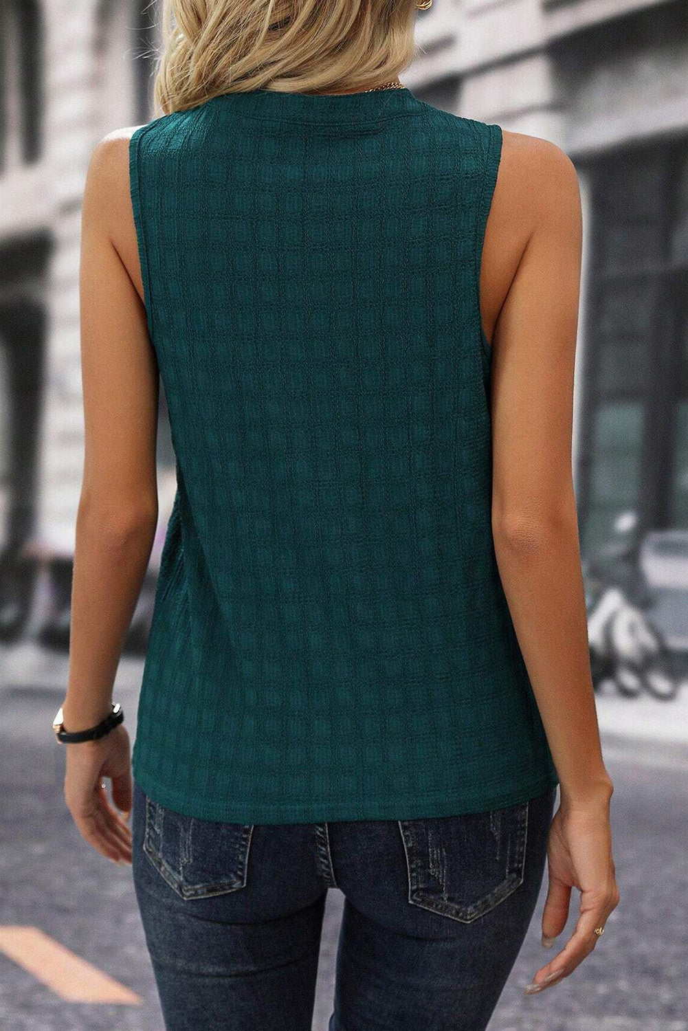 Solid Notched Sleeveless Blouse by Coco Charli