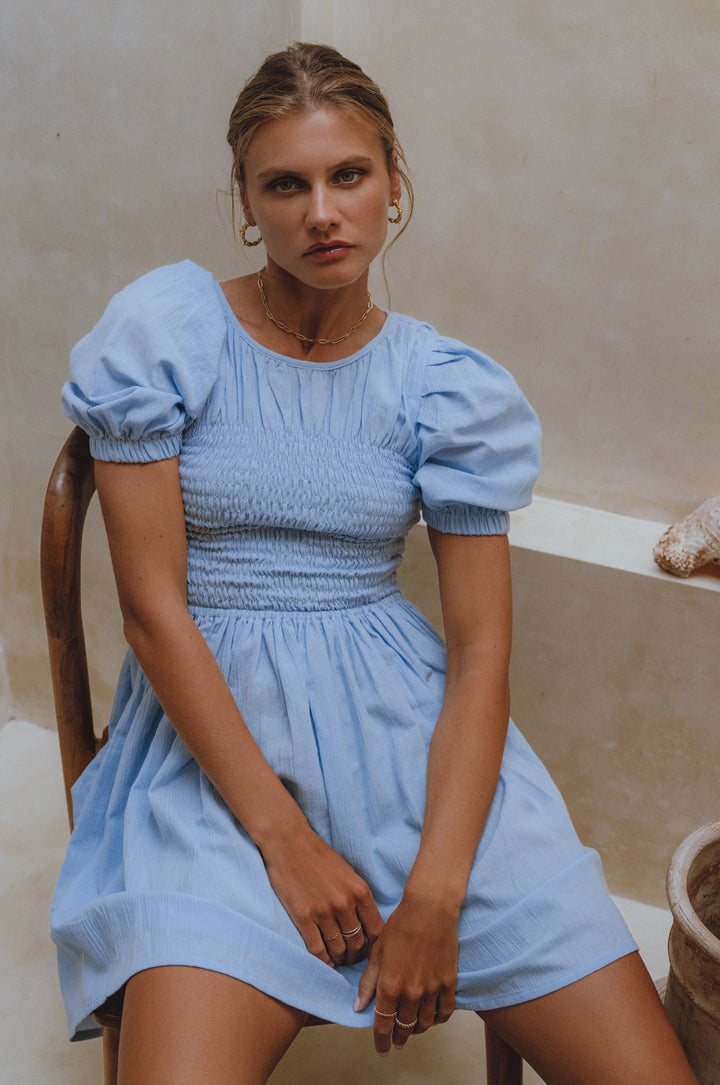 Elodie Smocked Linen Mini Dress by Bali Lane