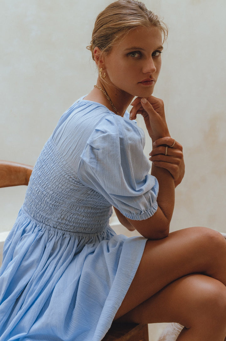Elodie Smocked Linen Mini Dress by Bali Lane