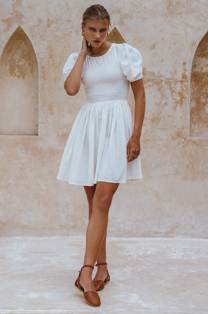 Elodie Smocked Linen Mini Dress by Bali Lane