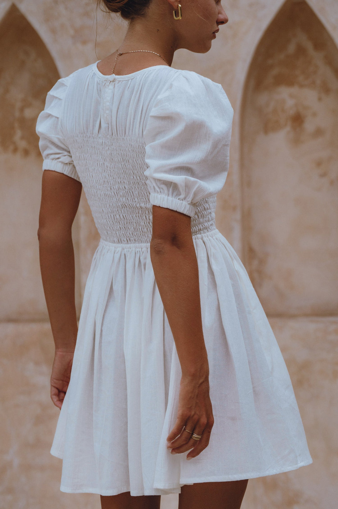 Elodie Smocked Linen Mini Dress by Bali Lane