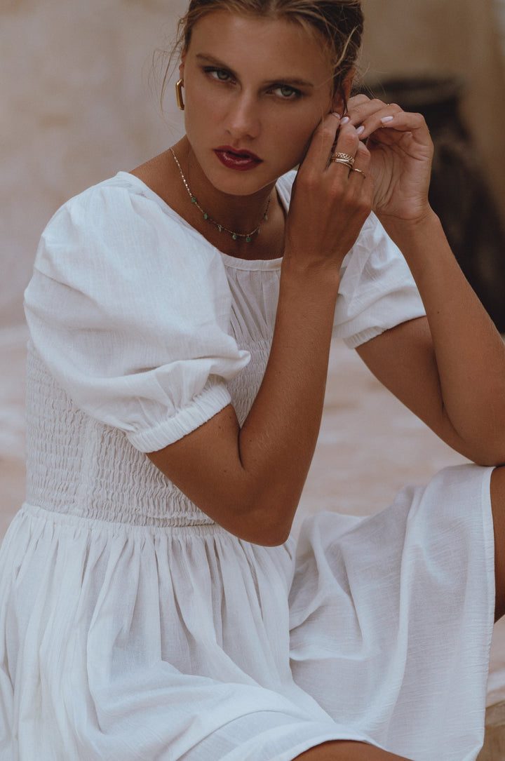 Elodie Smocked Linen Mini Dress by Bali Lane
