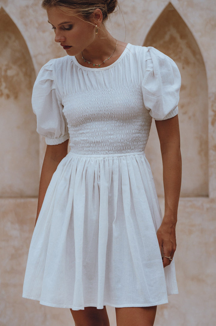 Elodie Smocked Linen Mini Dress by Bali Lane