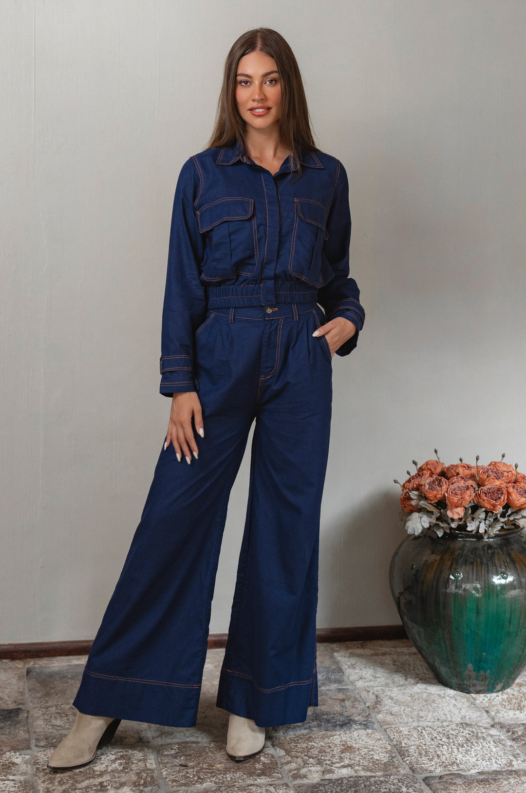 Woman wearing a blue line set with pants and jacket - cottage core style