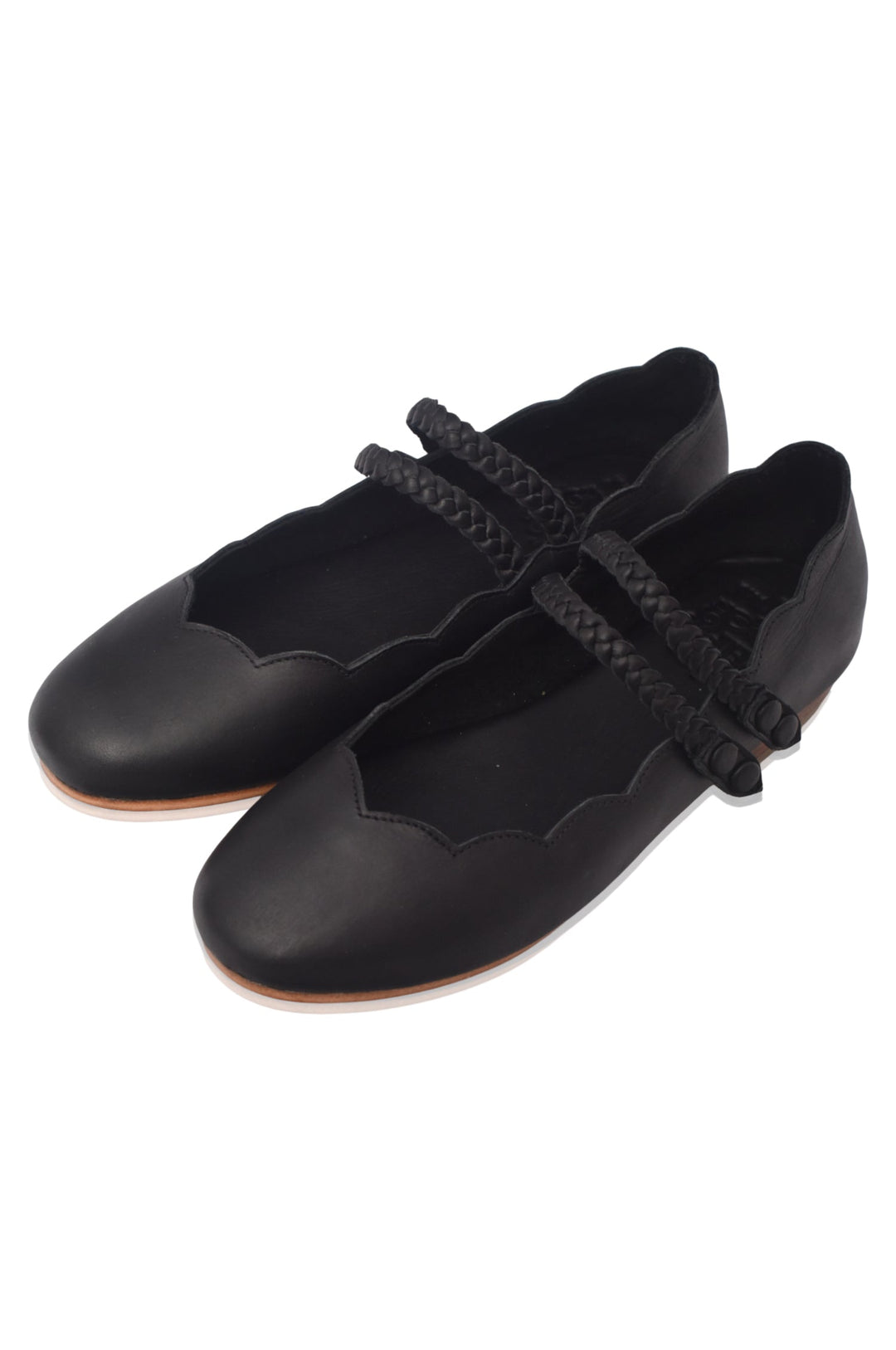 Pair of black ballet flats with braided detail and scalloped edges