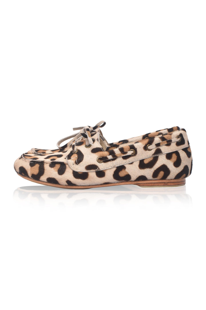 Leopard print flat shoe on a white background