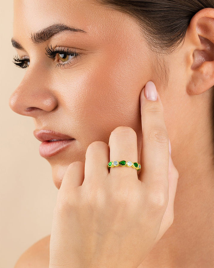 Pear and Round Bezel-Set Ring