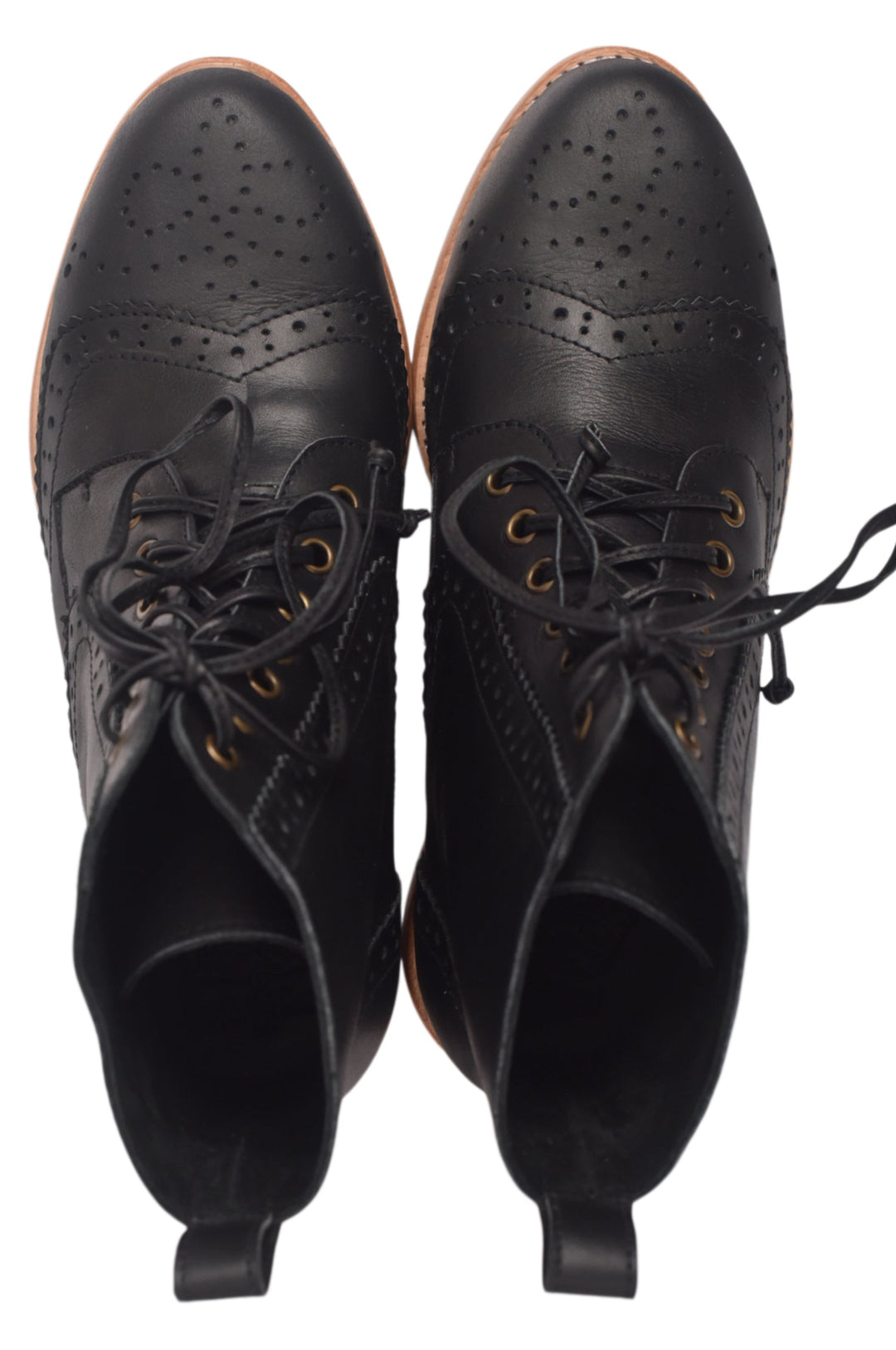 Pair of black leather boots with laces on a white background