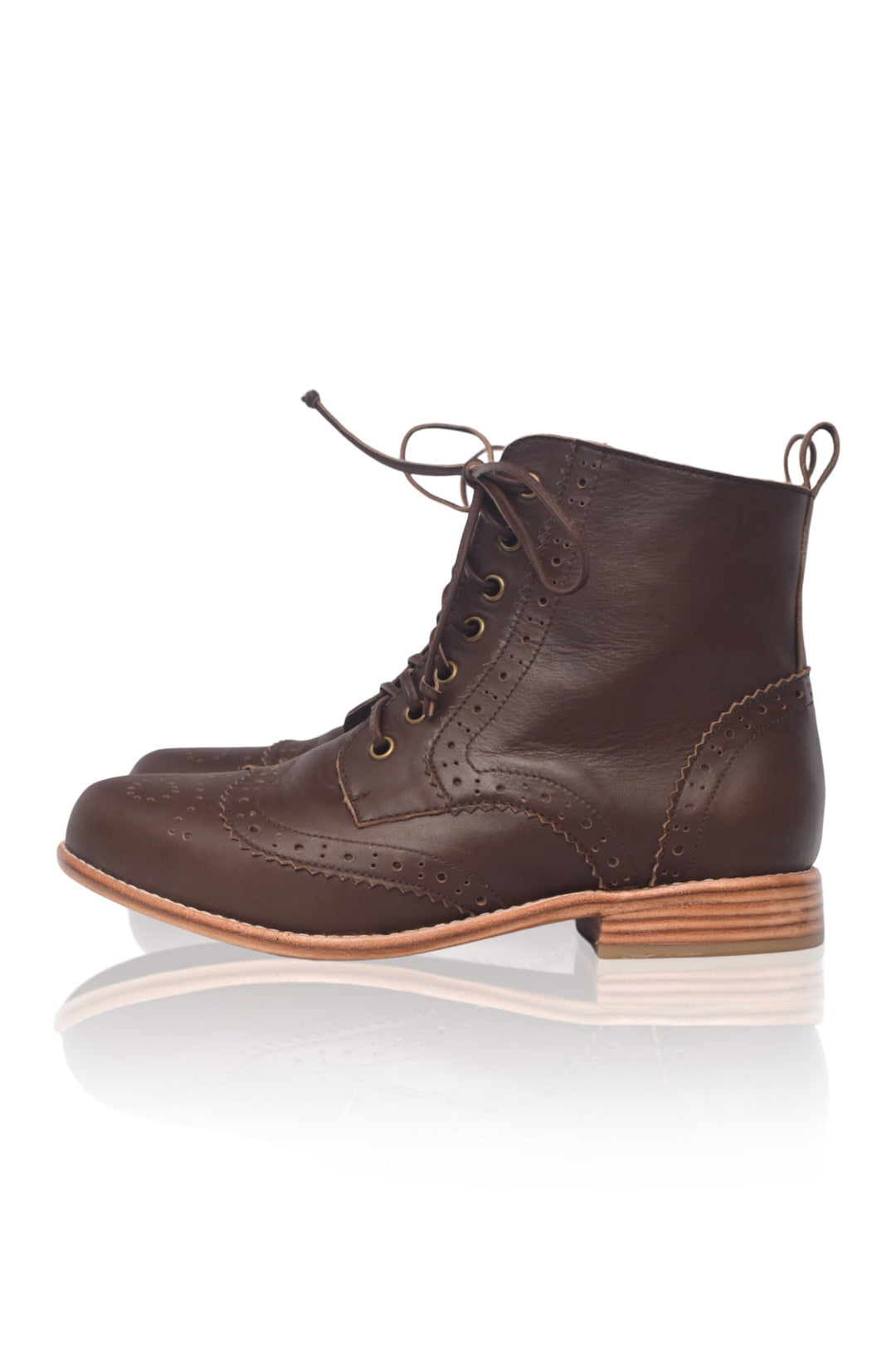 Brown leather boot on a white background