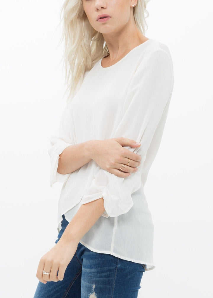 Women's Cross Hem Blouse by Shop at Konus