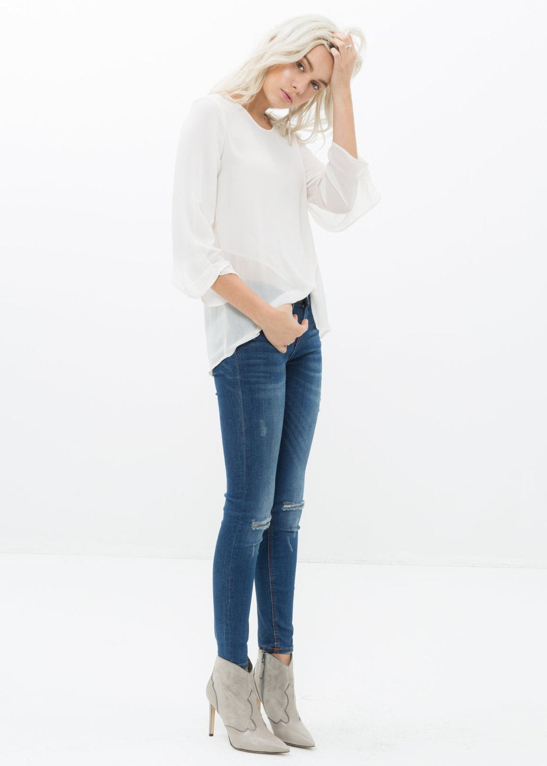 Women's Cross Hem Blouse by Shop at Konus